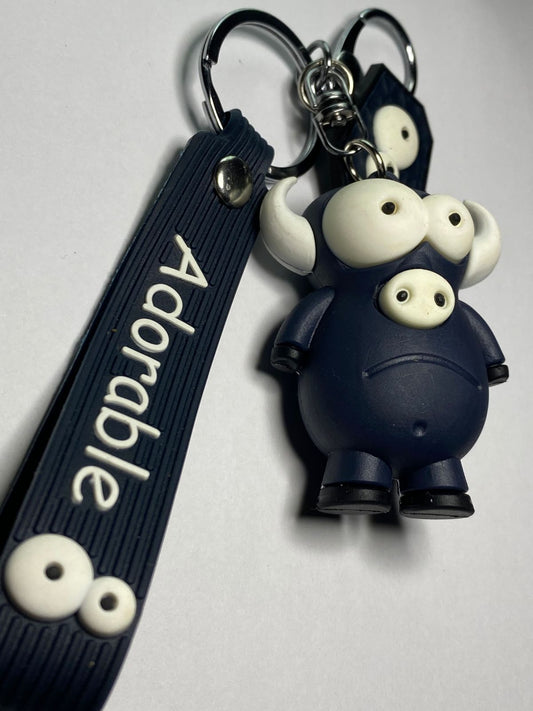 Adorable 3D Cartoon Bull Monster Keychain with "Adorable" Strap