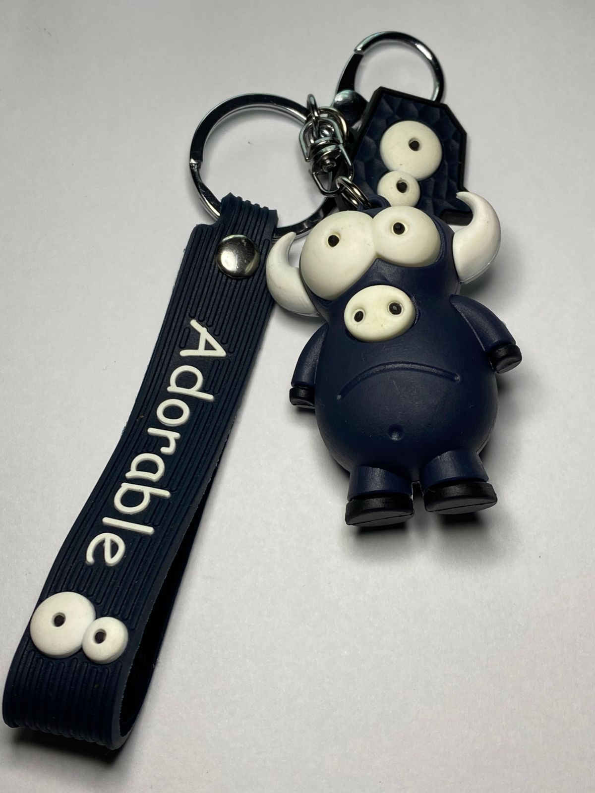 Adorable 3D Cartoon Bull Monster Keychain with "Adorable" Strap